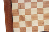 Up close image of marquetry detail on a Koi Chess Board Set