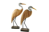Image of two carved Egrets 
