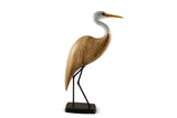 Picture of a Head Up Egret carving on a white background