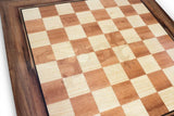 Closeup woodgrain image of a Gecko Chessboard