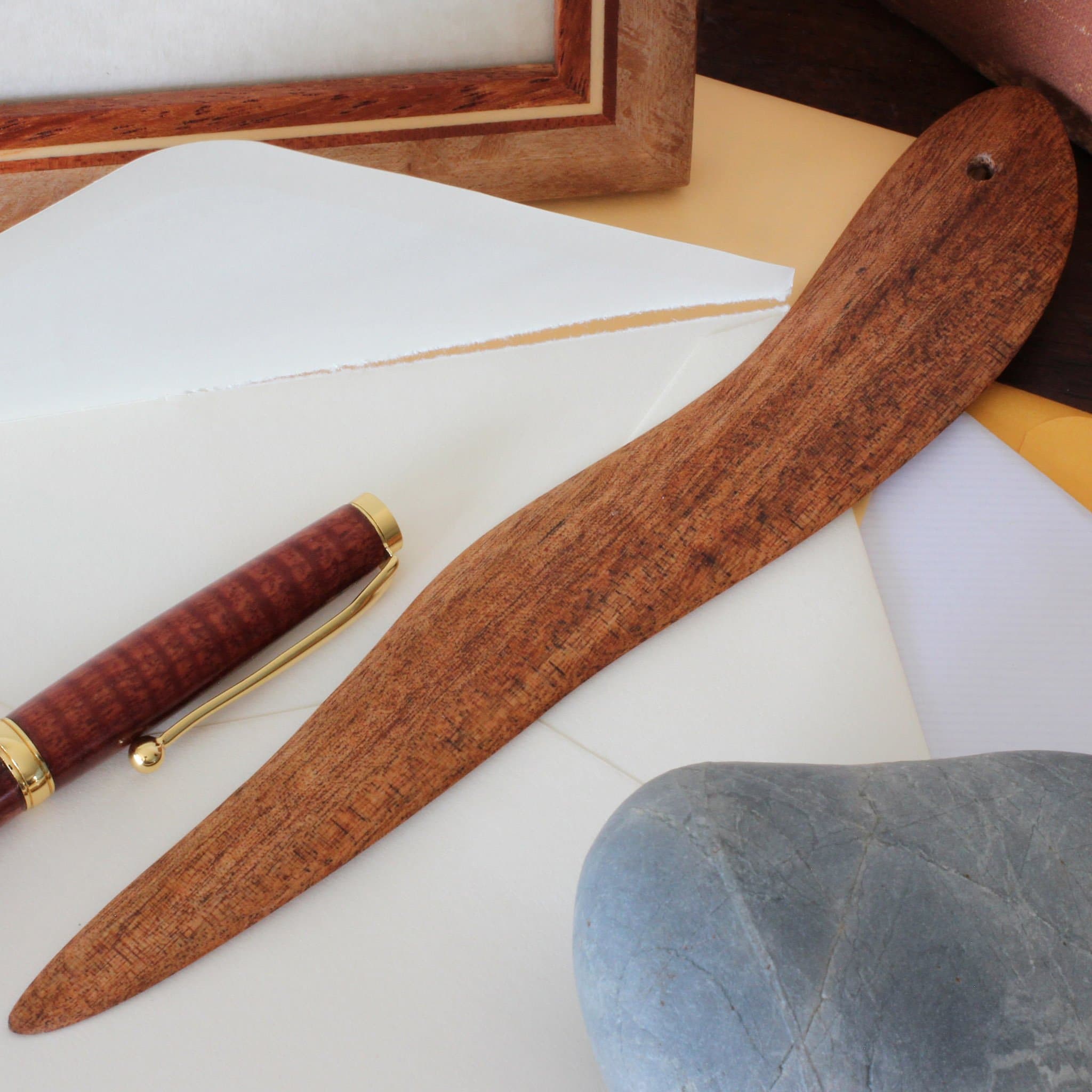 https://www.australianwoodwork.com.au/cdn/shop/products/hand-carved-gum-leaf-bookmark-letter-opener-2.jpg?v=1562055313