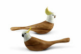 Image of two Sulphur Crested Cockatoo carvings