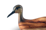 Detailed image of a head-up Sandpiper showing woodgrain