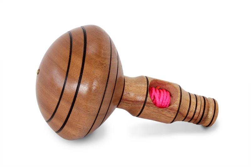 Closeup image of a Self-Winding Wooden Spinning Top