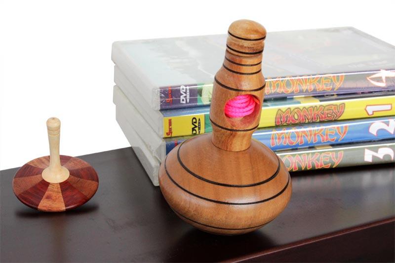 String-Pull Self-Winding Wooden Spinning Top with books