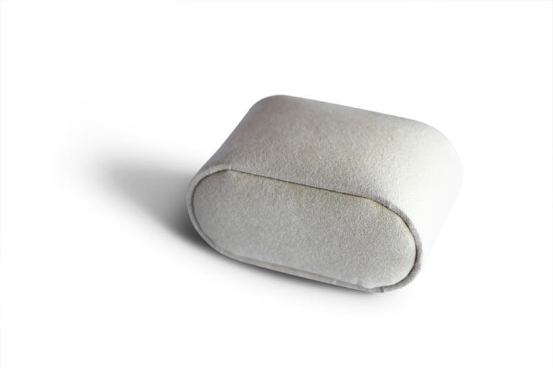 Picture of a single Watch Pillow on a white surface